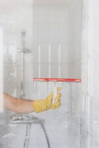 Clear glass shower screen cleaned with vinegar solution